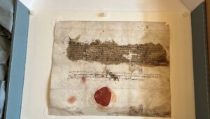 Akte uit het jaar 1469 waarin wordt verklaard dat de relikwie die door Jan Jan Walter aan de kerk van Naarden is geschonken, afkomstig is van Sint Vitus (SSAN015+134-12).